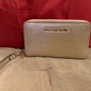 Michael Kors gold wristlet